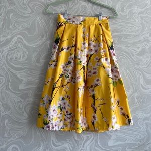 yellow knee length skirt